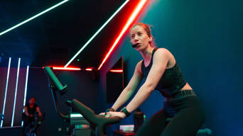 Woman On Spin Bike