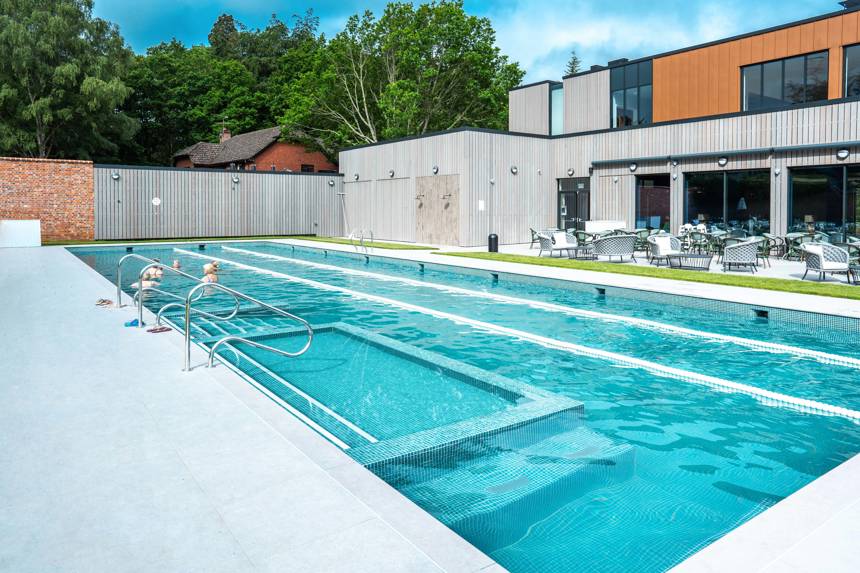 Outdoor pool with people